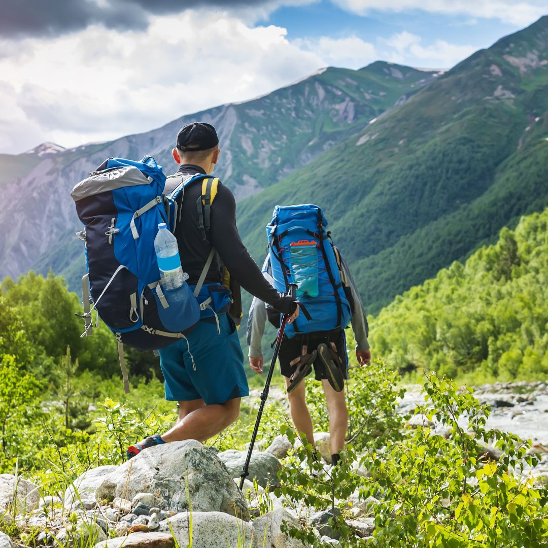 two people hiking mountain