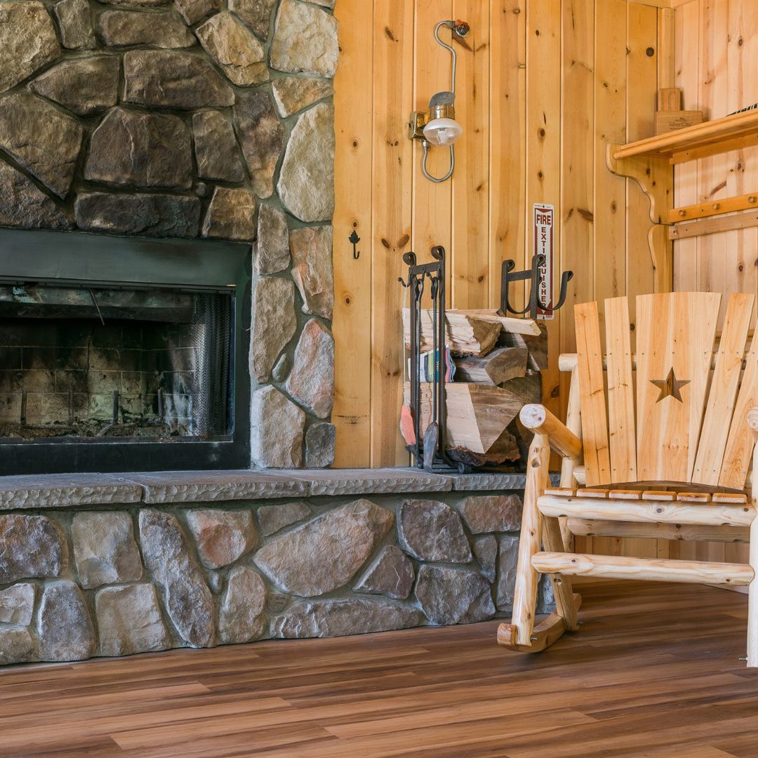 rocking chair by fire in cabin